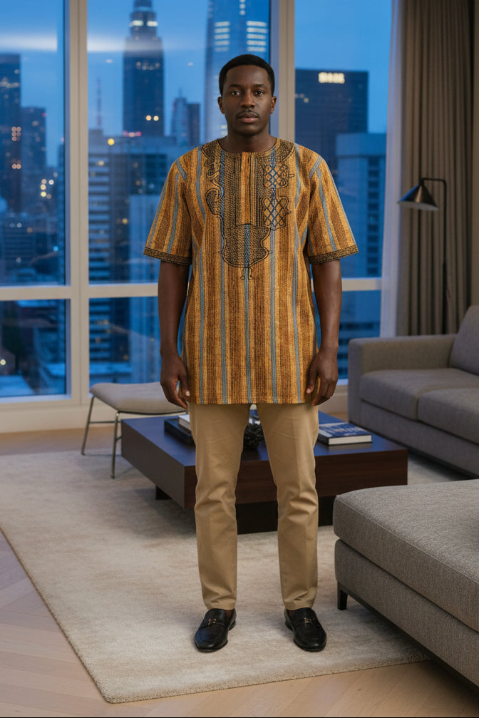 Person wearing a patterned shirt with a blurred outdoor background