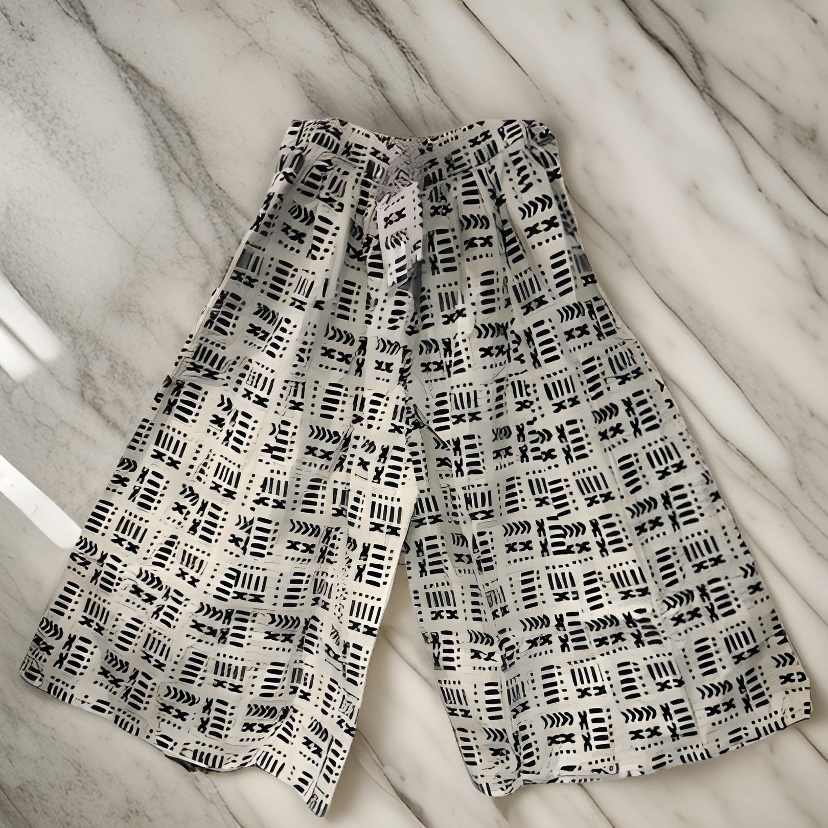 African White/Black Print Palazzo Pants - Premium African Apparel from MAGOS - Just $54! Shop this and more African Apparel now 