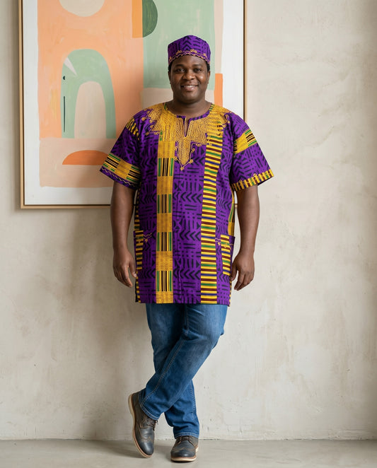 Person wearing a vibrant purple and yellow patterned shirt with blue jeans, standing against a neutral wall with abstract art.
