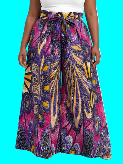 Colorful patterned skirt worn by a person on a white background