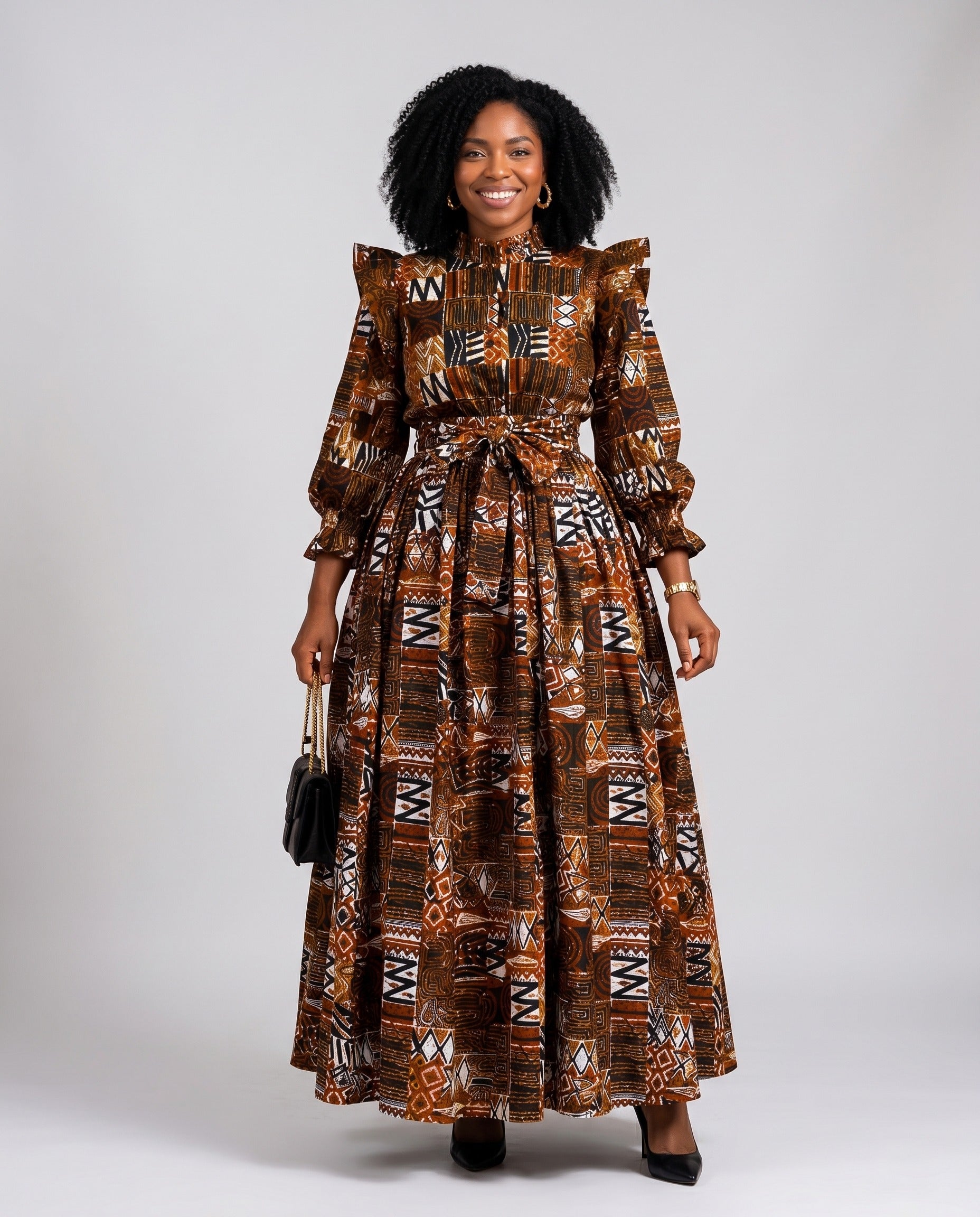 Woman wearing a patterned dress on a plain background