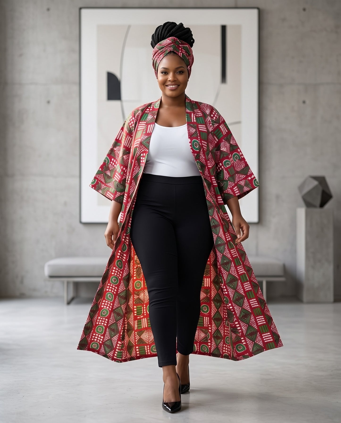 Woman wearing a long, patterned coat in a modern interior setting