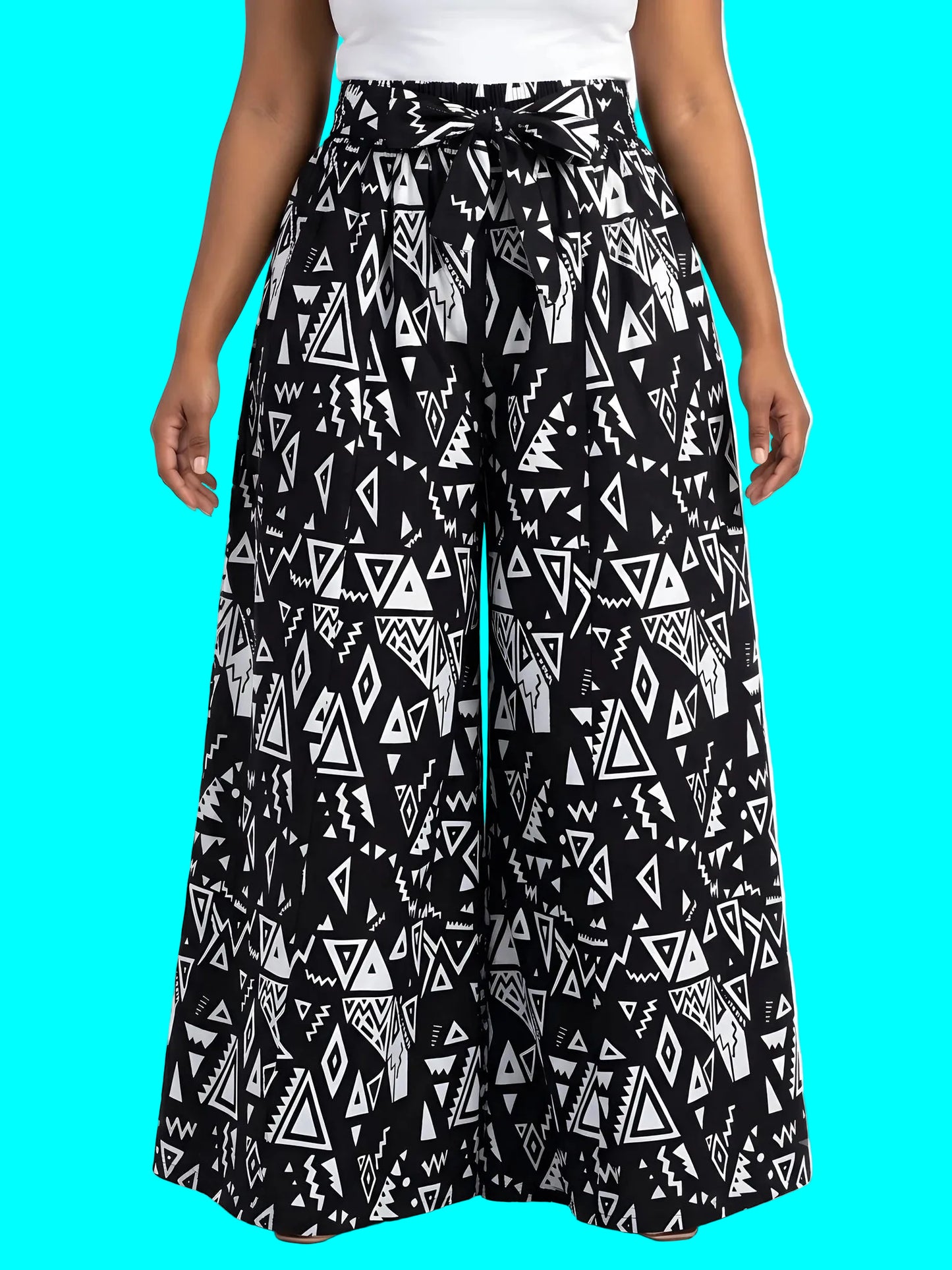 Black and white patterned wide-leg pants worn by a person on a white background