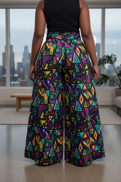 Colorful geometric patterned pants on a white background
