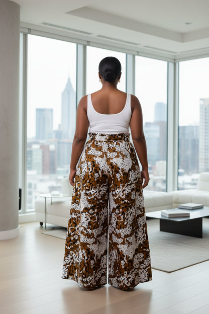 Wide-leg pants with a brown and white pattern on a white background