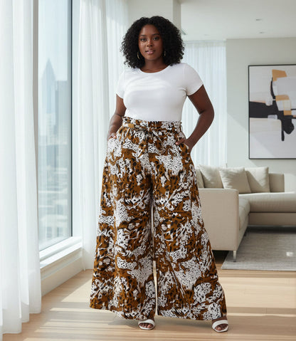 Wide-leg pants with a brown and white pattern on a white background