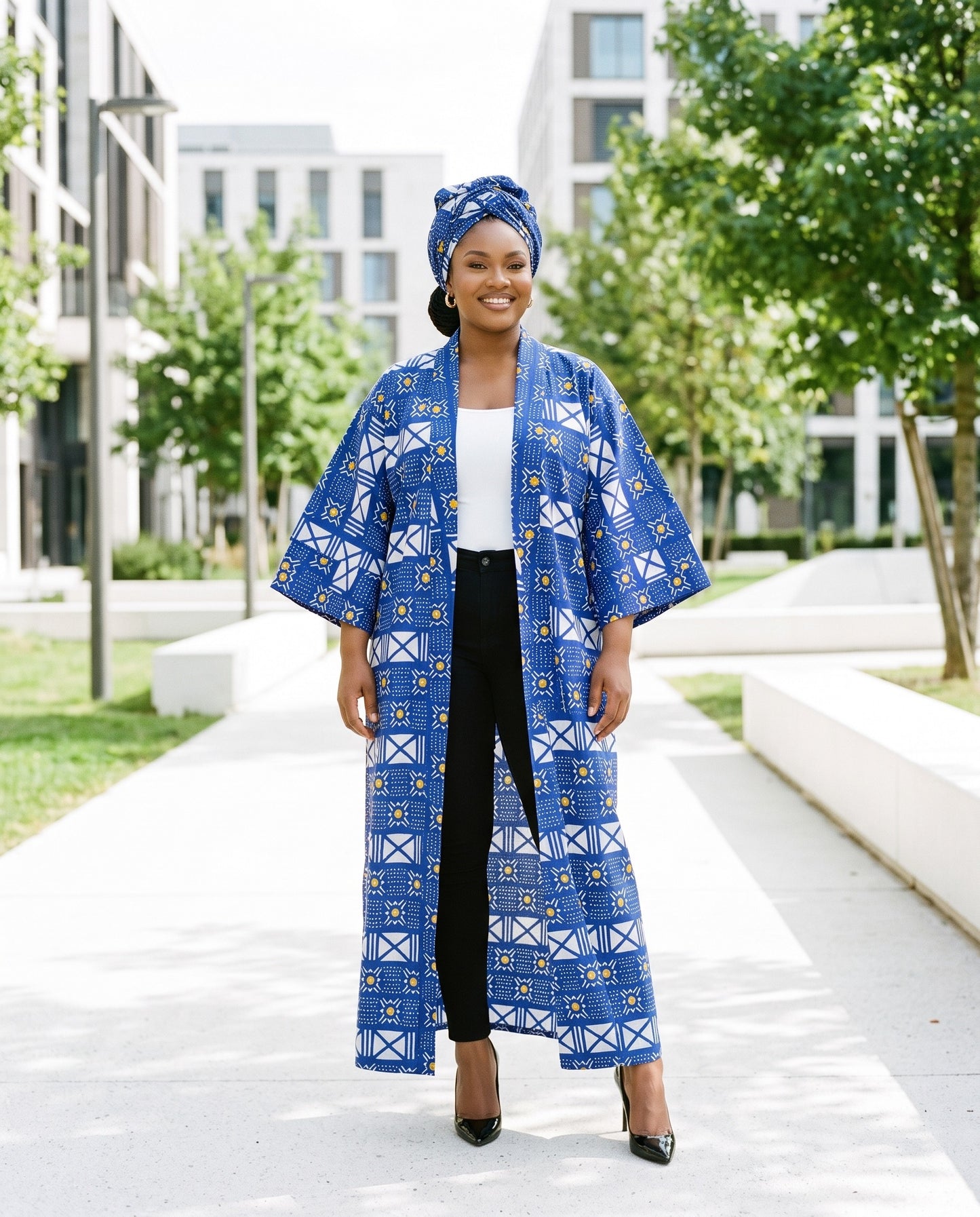 Woman wearing a blue and white patterned kimono in an urban setting