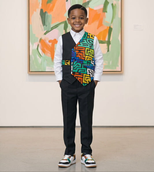 Child wearing a colorful geometric vest in an art gallery setting